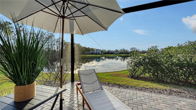 view of patio / terrace featuring a water view