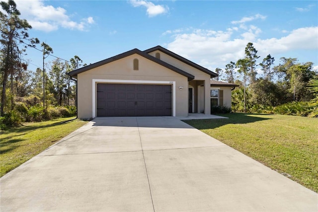 view of front of house with concrete driveway, a front lawn, an attached garage, and stucco siding