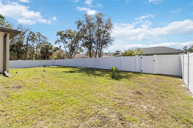 view of yard featuring a fenced backyard