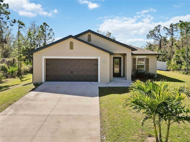 single story home with an attached garage, stucco siding, concrete driveway, and a front yard