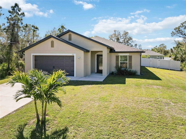 ranch-style home with stucco siding, a shingled roof, fence, a garage, and a front lawn