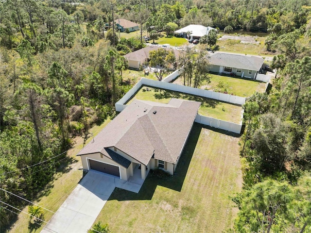 aerial view featuring a forest view