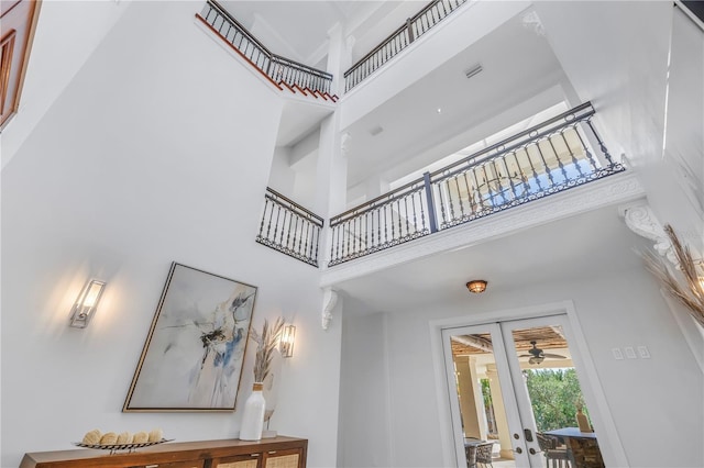 3935 N Shell Rd, Sarasota, FL 34242 - staircase with a towering ceiling and a ceiling fan