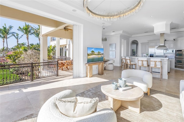 3935 N Shell Rd, Sarasota, FL 34242 - living area featuring crown molding, a ceiling fan, light tile patterned floors, and recessed lighting