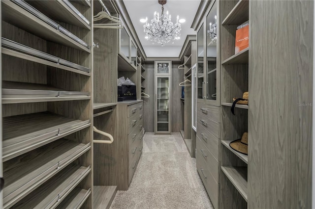 3935 N Shell Rd, Sarasota, FL 34242 - walk in closet with a chandelier and light carpet