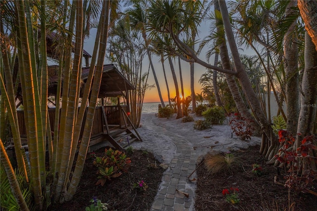 3935 N Shell Rd, Sarasota, FL 34242 - yard at dusk featuring a gazebo and a water view