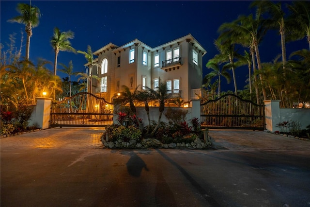 3935 N Shell Rd, Sarasota, FL 34242 - mediterranean / spanish-style home featuring a gate and stucco siding