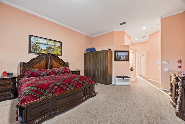 carpeted bedroom featuring recessed lighting, visible vents, crown molding, and baseboards