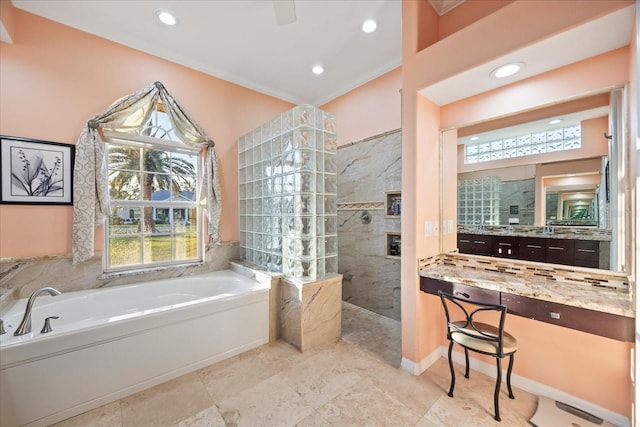 bathroom featuring a garden tub, crown molding, recessed lighting, a tiled fireplace, and walk in shower