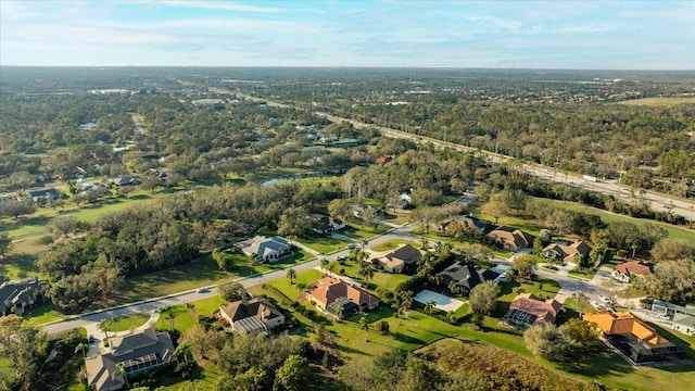 aerial view with a forest view and a residential view