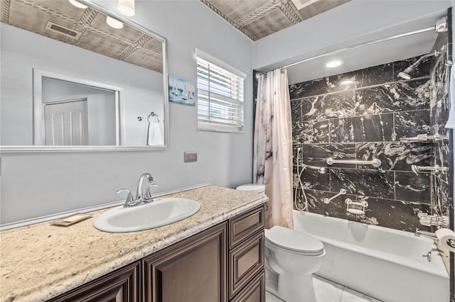 bathroom featuring toilet, shower / tub combo, and vanity