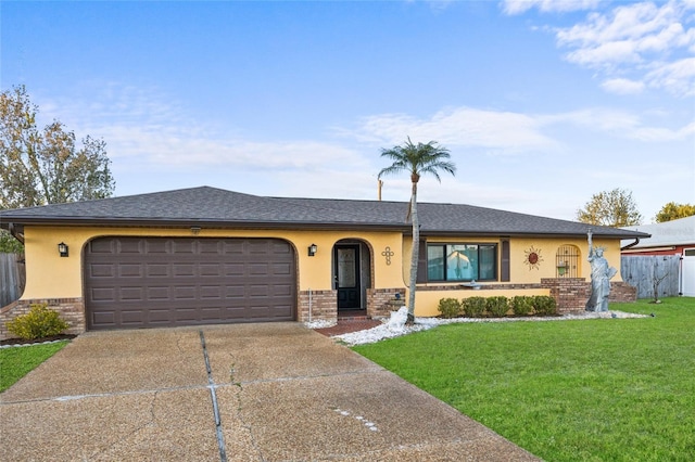 ranch-style house featuring concrete driveway, brick siding, fence, and a front lawn