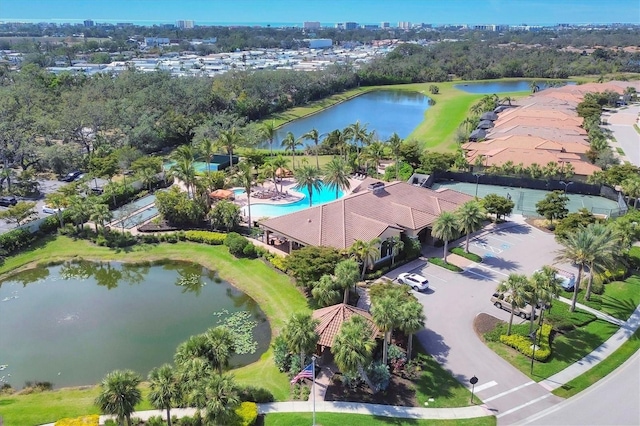 birds eye view of property featuring a water view