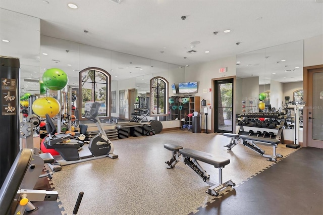 gym with recessed lighting