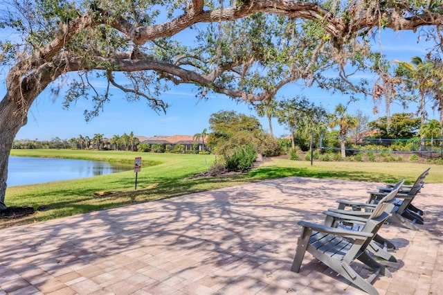 view of patio / terrace featuring a water view and volleyball court