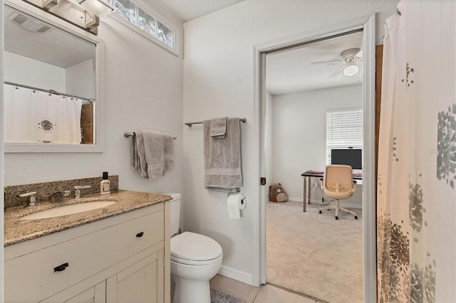 bathroom featuring baseboards, visible vents, a ceiling fan, toilet, and vanity