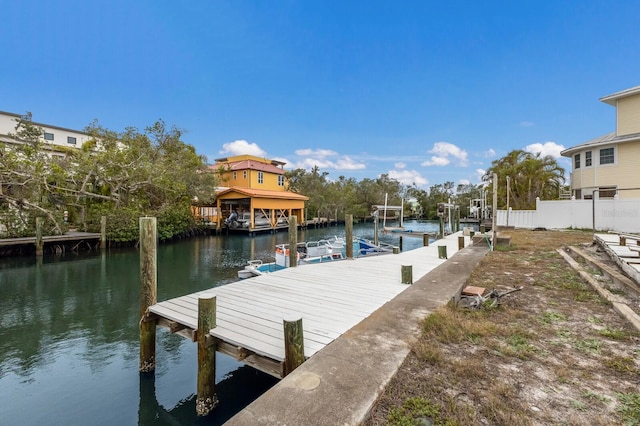 dock area featuring a water view and boat lift