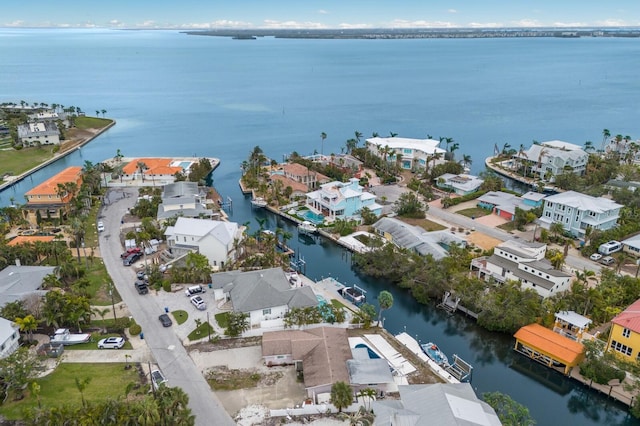 aerial view featuring a residential view and a water view