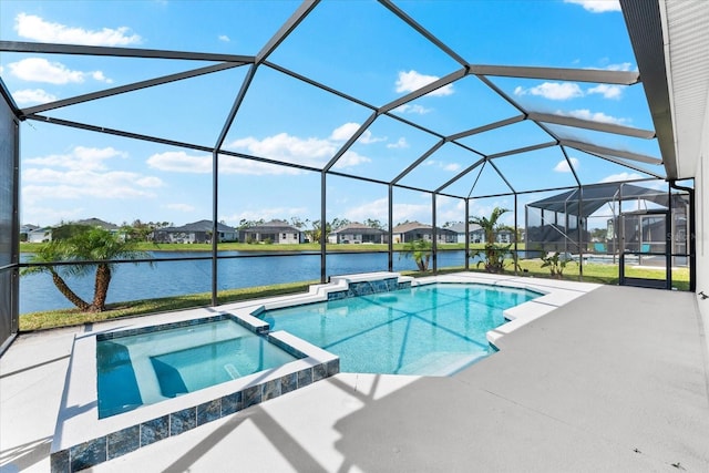 view of pool featuring a pool with connected hot tub, a lanai, a water view, and a patio