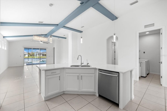 kitchen featuring light countertops, stainless steel dishwasher, a kitchen island with sink, white cabinets, and a sink