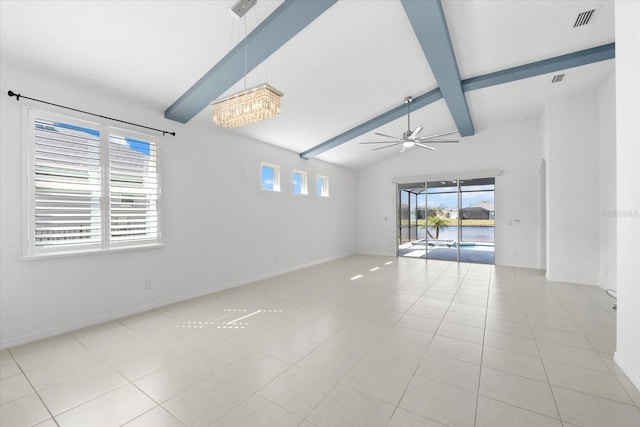 spare room with light tile patterned floors, visible vents, lofted ceiling with beams, a ceiling fan, and baseboards