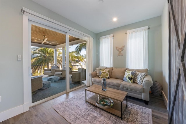 interior space featuring wood finished floors and baseboards