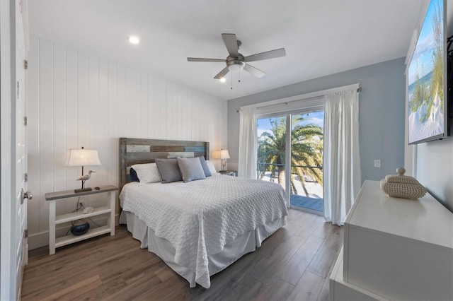 bedroom featuring access to outside, ceiling fan, and wood finished floors