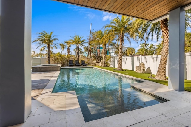 view of pool featuring a fenced in pool, a patio area, a fenced backyard, and an in ground hot tub