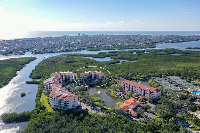 drone / aerial view with a water view