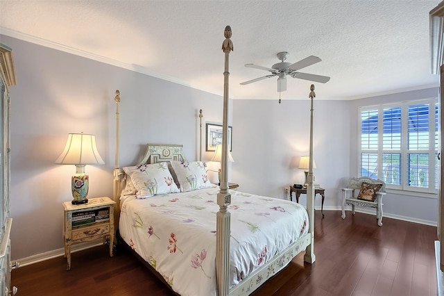 bedroom with ornamental molding, wood finished floors, and a textured ceiling