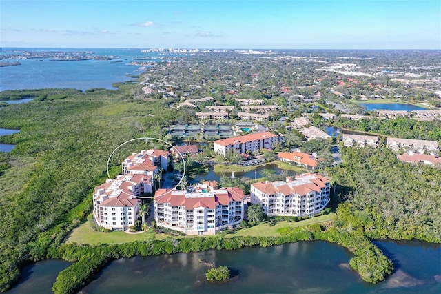 bird's eye view with a water view