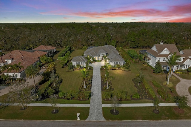 aerial view at dusk with a residential view