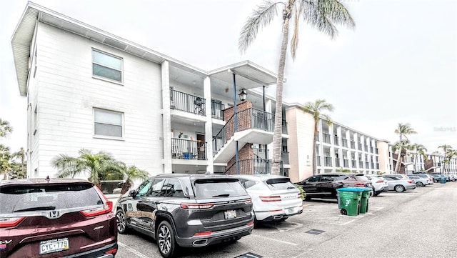 2057 Sunset Dr Unit G1, Bradenton, FL 34207 - view of building exterior featuring uncovered parking