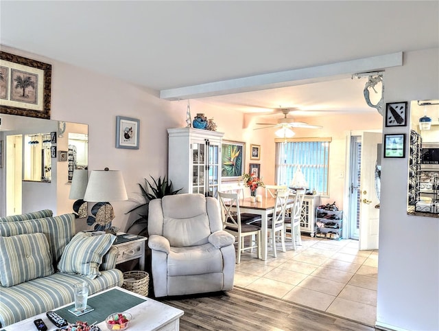 2057 Sunset Dr Unit G1, Bradenton, FL 34207 - living area featuring a ceiling fan, beam ceiling, and light tile patterned floors