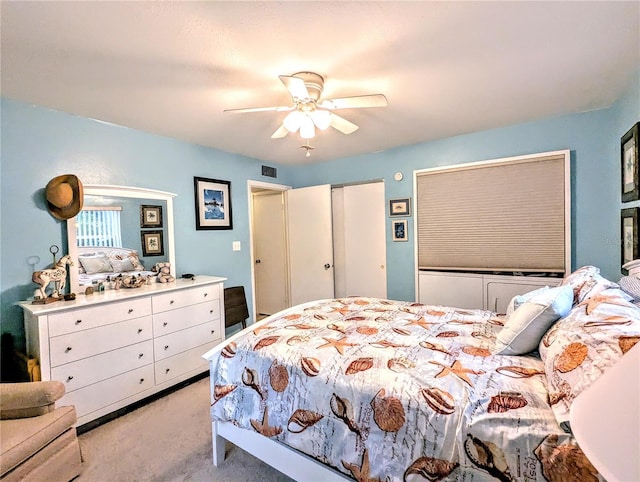 2057 Sunset Dr Unit G1, Bradenton, FL 34207 - bedroom with light carpet and a ceiling fan