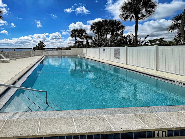 community pool with fence