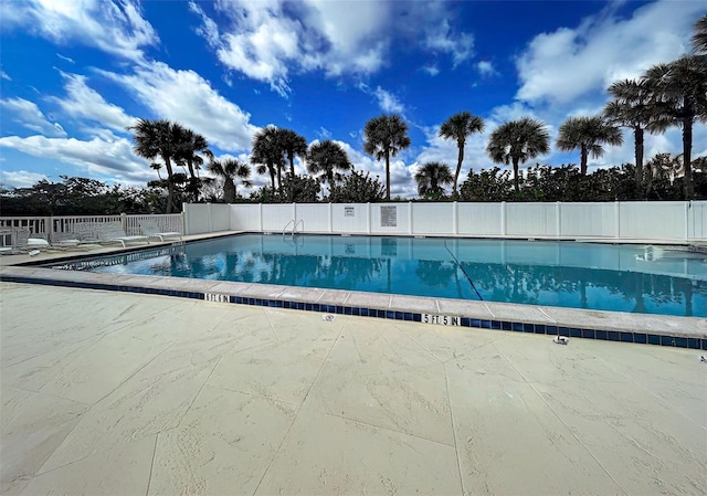 pool featuring fence