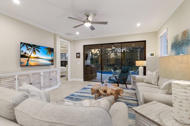 living room featuring baseboards, ceiling fan, ornamental molding, wood finished floors, and recessed lighting