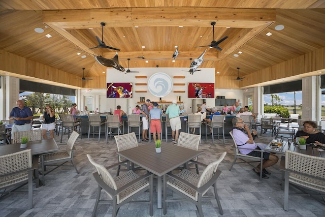 view of patio featuring outdoor dining area and ceiling fan