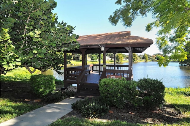 view of dock featuring a water view and a gazebo