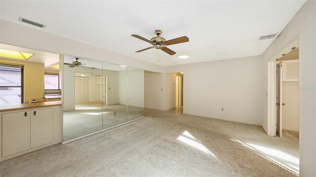 3692 Glen Oaks Manor Dr, Sarasota, FL 34232 - unfurnished bedroom with light carpet and ceiling fan