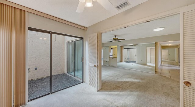 3692 Glen Oaks Manor Dr, Sarasota, FL 34232 - carpeted spare room with a ceiling fan