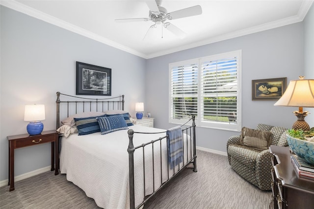 bedroom featuring ornamental molding, carpet, a ceiling fan, and baseboards