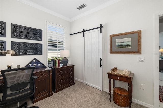 office area with a barn door, light carpet, visible vents, baseboards, and crown molding