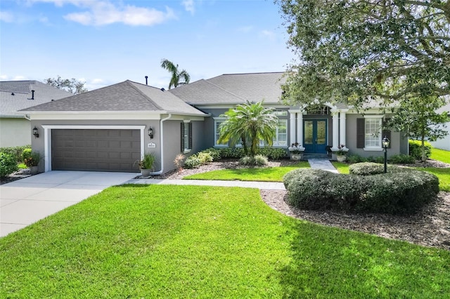 view of front of home featuring concrete driveway, an attached garage, french doors, a front yard, and stucco siding