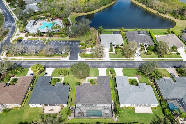 bird's eye view with a residential view and a water view