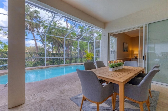 dining area with a sunroom