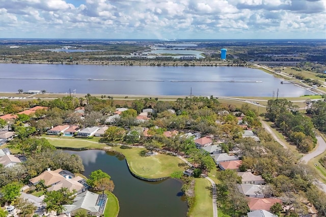 birds eye view of property featuring a residential view and a water view