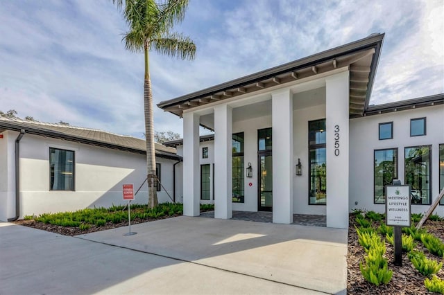 exterior space featuring stucco siding