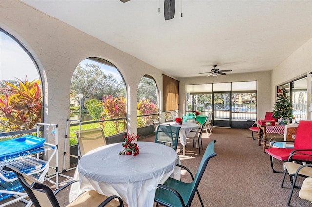 interior space featuring ceiling fan